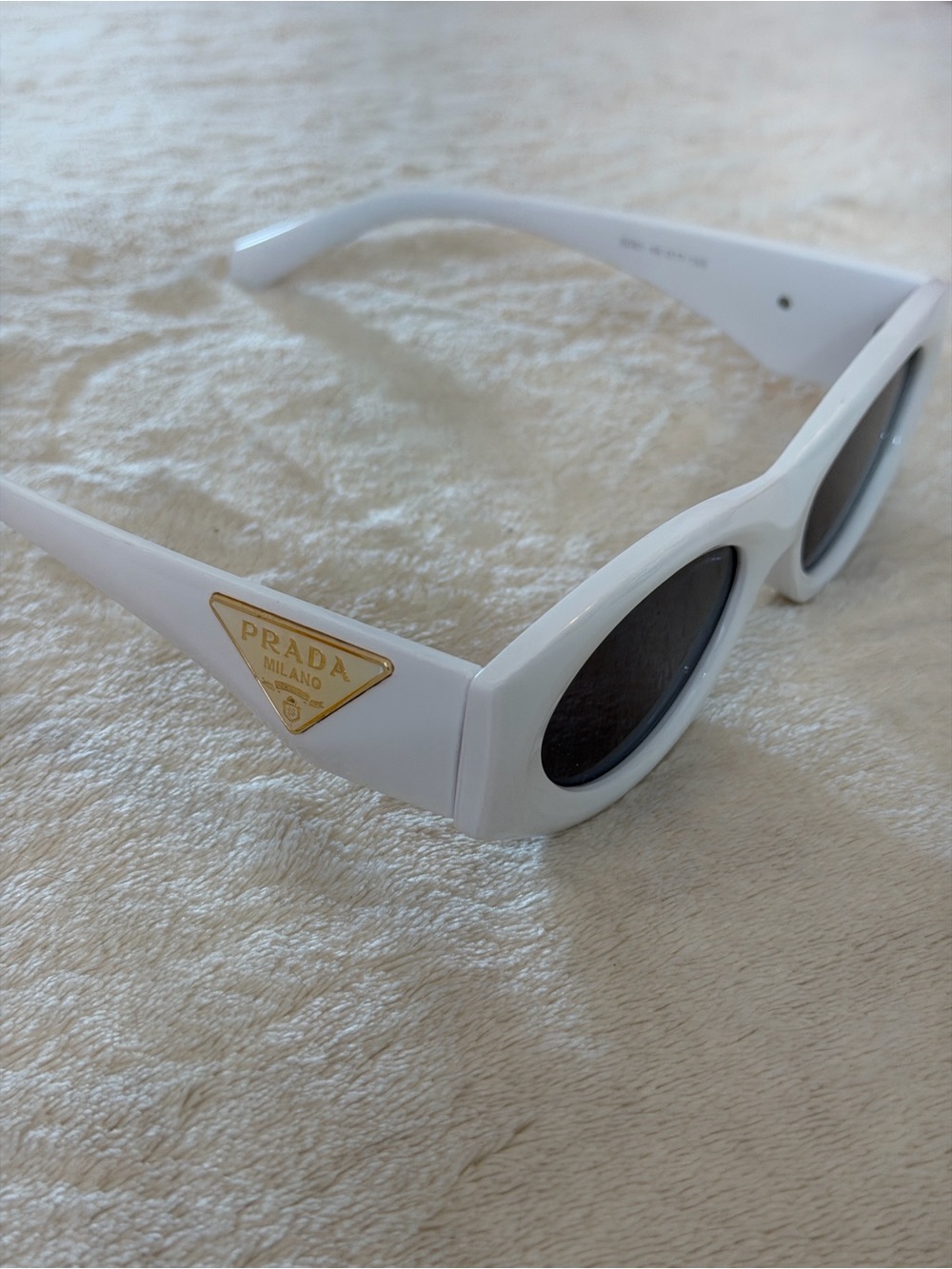 Prada Kids White Oval Sunglasses with Gold Triangle Logo